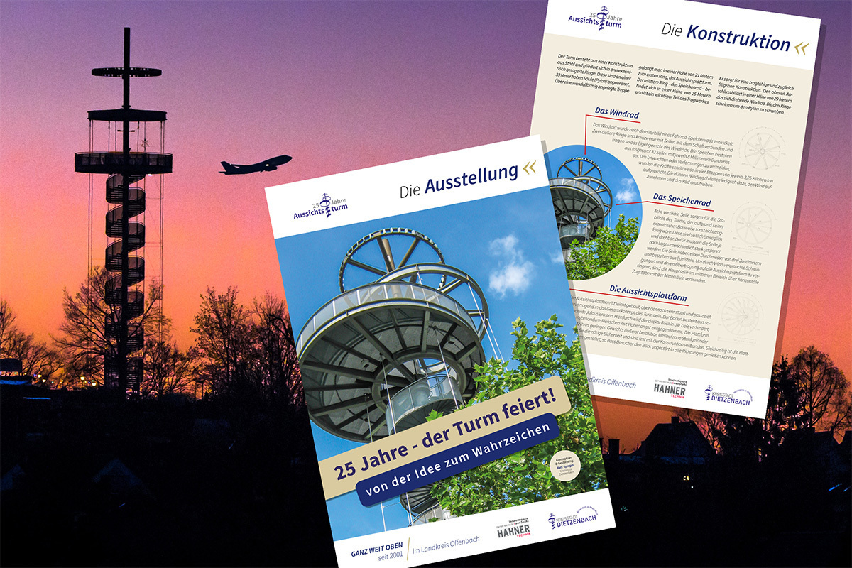 Turm im Abendlicht mit zwei Ausstellungsplakaten im Vordergrund.
